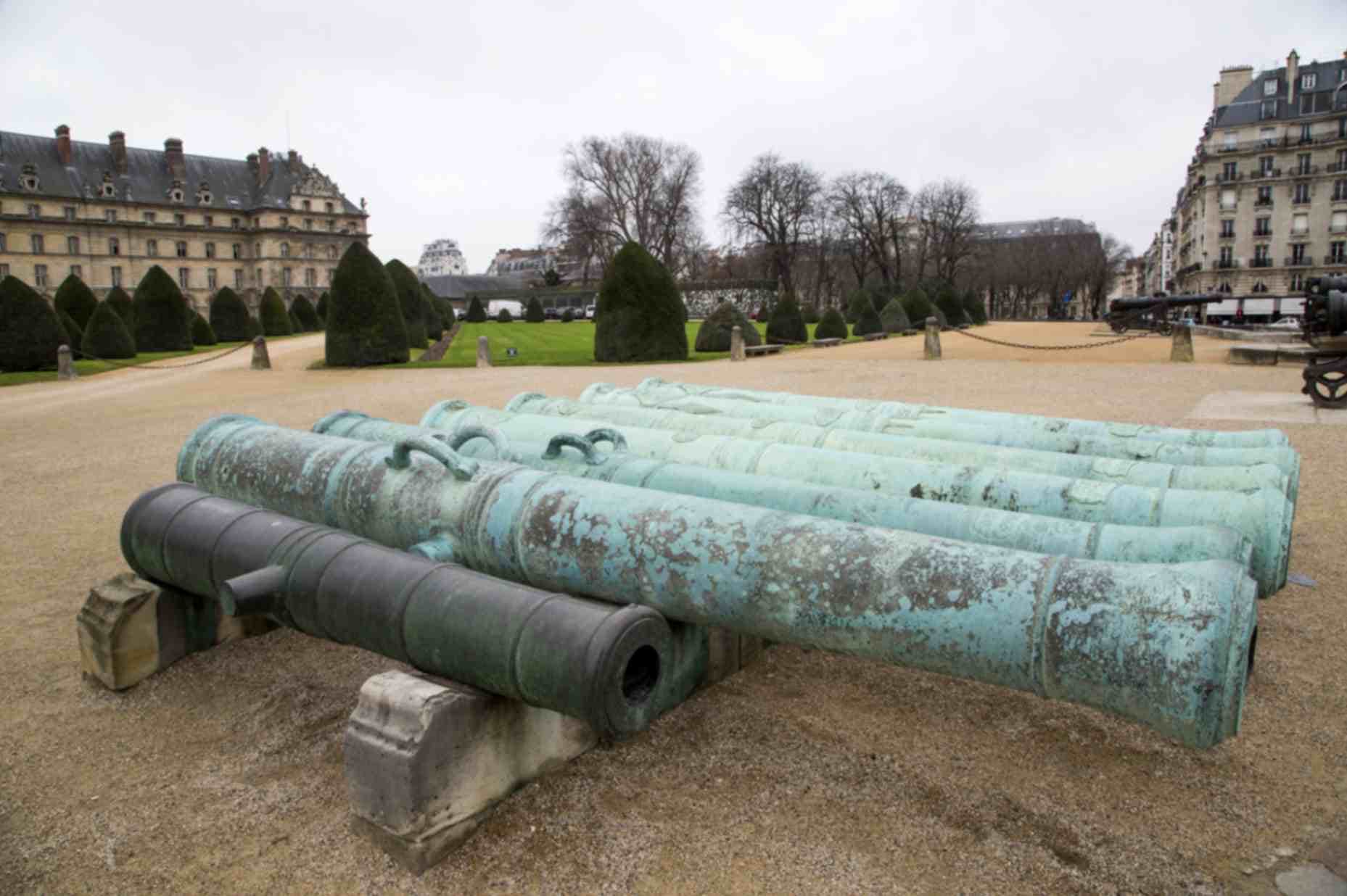 Weathered Bronze Cannons Displayed Outdoors